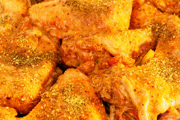 Appetizing chicken legs in a juicy spicy sauce are prepared