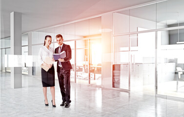 Fototapeta premium Businessman wearing formal suit and businesswoman in white shirt