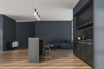 Dark blue living space with breakfast bar table in modern kitchen area