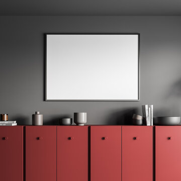 Horizontal poster with a red sideboard on a living room wall