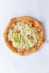 Homemade pizza isolated on white background. View from above.