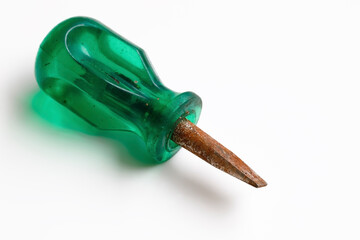 One screwdriver with green handle