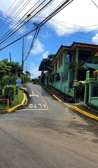 Colorfull road in Costa rica with accomodations  - obrazy, fototapety, plakaty
