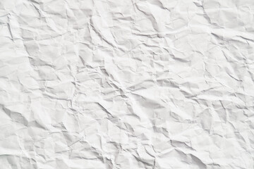 White crumpled paper texture with wrinkles. Damaged and torn sheet