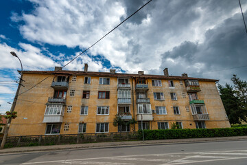 Fototapeta na wymiar Old apartment building in very bad condition build in the communist era in Romania.