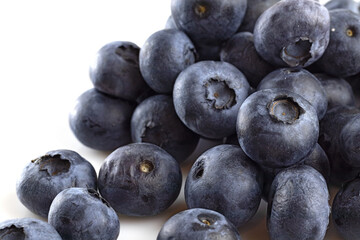 Image of ripe blueberry close-up. The berries and leaves are used for medicinal purposes.