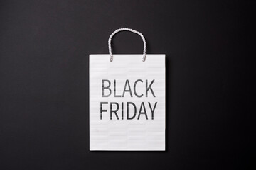 Black friday concept. Shopping bags on black background.