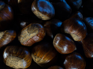 Close up view of chestnuts with black background