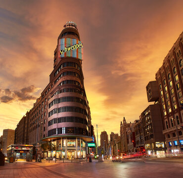 Madrid, Spain - September 1, 2021. Nightfall view of Callo square with the Carrion building in the background. Madrid, Spain.