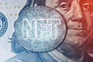 NFT on on us dollar. Close-up. Rise of NFT technology. Rolling out new NFT technology. Monetizing art with new digital NFT currency