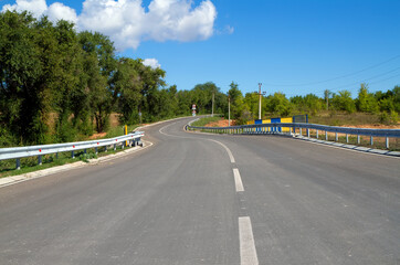 Winding asphalt road.