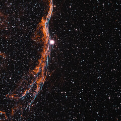 Fototapeta na wymiar Heated clouds of ionized gas in the Veil Nebula