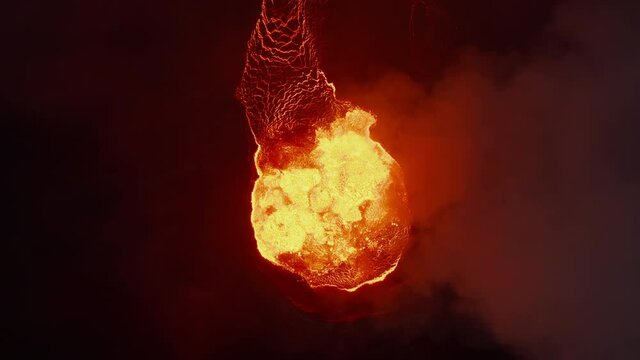 Aerial birds eye overhead top down view of crater with hot magma at night. Boiling molten lava. Fagradalsfjall volcano. Iceland, 2021