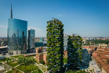 Fototapete Milaan Aerial photo of Bosco Verticale, Vertical Forest, in Milan, Porta Nuova district. Residential buildings with many trees and other plants in balconies