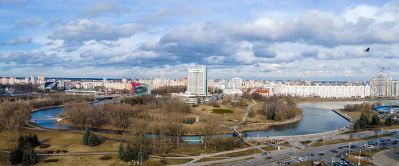 Top view of the small town. Aerial shot of a small old town by the river with tileed roofs. Neighborhood concept.