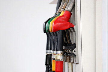 Petrol hoses on filling station in a row. Gas station service