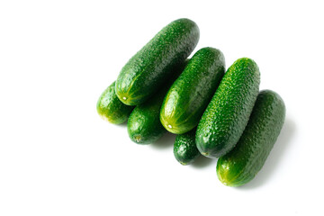 green fresh cucumbers isolated on white background