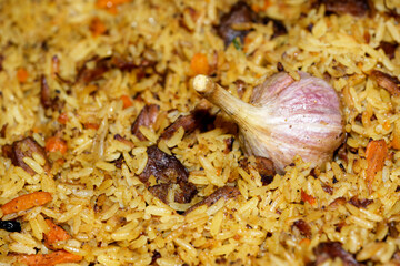 Pilaf cooked in a cauldron
