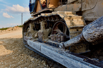Fototapeta na wymiar Working large machine excavator ground leveling construction