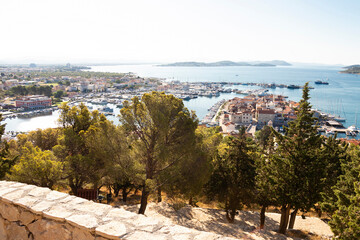 View point from the St Nicolas hill above old town Tribunj, by the sea with the yachting marina