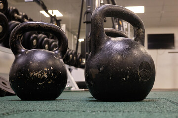 Fototapeta na wymiar kettlebell weights on rubber floor ready for strength and conditioning workout