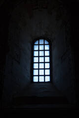 Backlit window in Castel del Monte (Italy)