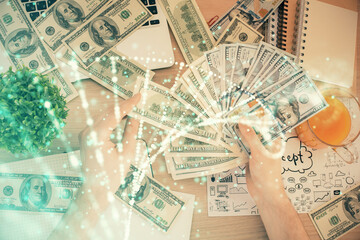 Multi exposure of dna drawing hologram and USA dollars bills and man hands. Medical education concept.