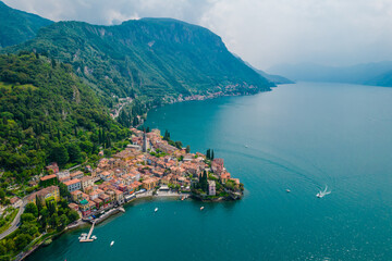 Aerial view of Varenna village on a coast of Como lake, Italy on a cloudy day