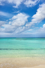 View of a beach and sea in the Mexican Caribbean, a sunny day with crystal clear water.