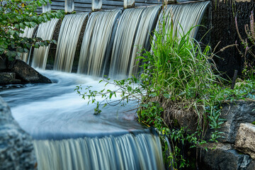 Waterfall from an old watermill located in Forsmark mill Sweden