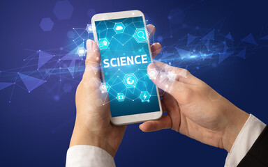 Hand using smartphone with technology concept