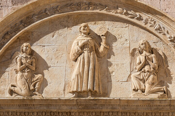 Assisi village in Umbria region, Italy. Detail of the most important Italian Basilica dedicated to St. Francis - San Francesco.
