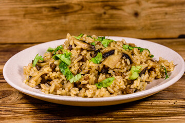 Risotto with mushrooms and paesley in a plate