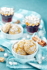 Pumpkin cookies with cups of coffee