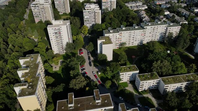Aerial of suburban area in Munich Germany in 4k UHD, Drone view of apartments and parks, block