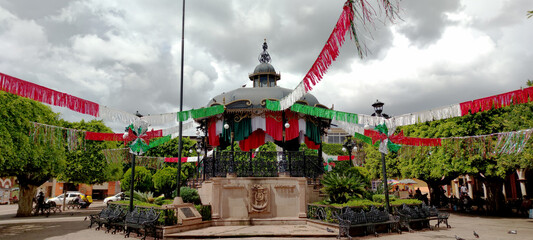 Horizontal photo in color about ornaments on buildings, in honor to celebrate mexican independence...