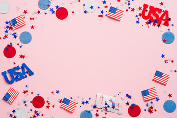 Obraz premium Happy Labor Day banner mockup. Frame made of USA flag color confetti and decorations on pink background. US Independence Day, Memorial Day, US Veterans day concept.