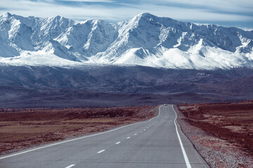 View of the mountain landscape and highway through the Altai Mountains to Mongolia.
