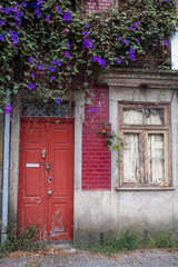 The facade of an abandoned building in Porto, Portugal.