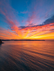 Fototapeta premium High Cloud Sunrise Seascape with Soft Shades of Colour