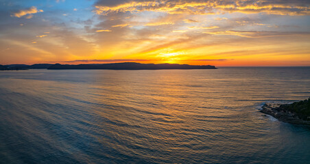 Fototapeta na wymiar High Cloud Sunrise Panorama Seascape