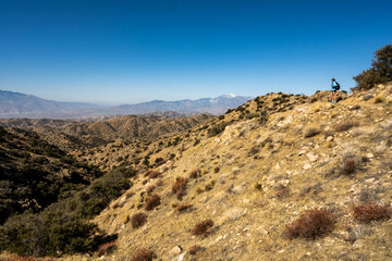 Hiker Looking Out Toward Onyx Peak