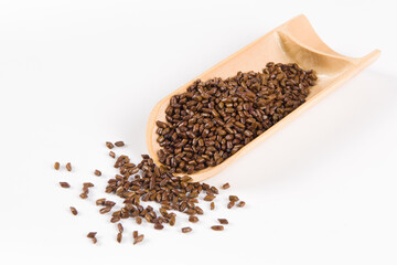 Chinese herbal medicine cassia seeds on white background
