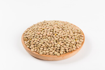 Naklejka premium raw lentil culinaris beans isolated on white background