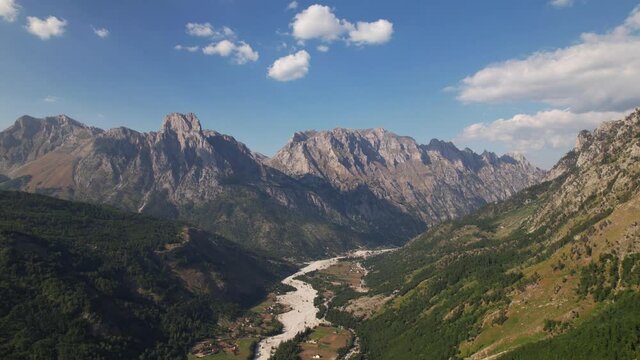 Paradise alpine landscape on valley of Valbone, high mountains and green forests