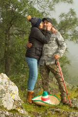 young latinos demonstration of love in the mountains
