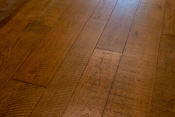 Hard wood natural floor for use as texture background, with planks at a slight angle.