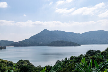 The lake and blue sky and white clouds in the backlight