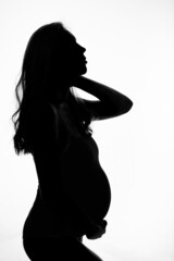 silhouette of Pregnant woman on a white background