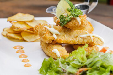 fish and chips with salad
